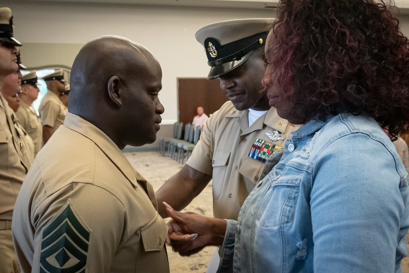 Marine 1st Sgt. Sonlord Jean, left, receives the Chief Petty Officer’s rank insignia to recognize his earning of the honorary title of “Chief” during a ceremony held Tuesday, September 16, 2025 aboard Marine Corps Air Station Cherry Point.  
Seven Sailors promoted to the rank of Chief Petty Officer while Sonlord and another Marine earned the honorary title of Chief Petty Officer. Marines, whose rank structure differs from the Navy’s, receive the honorary title in recognition of their leadership and alignment with Navy traditions.  While not authorized to wear the Chief Petty Officer’s Anchor outwardly on their uniforms, honorary Chiefs carry the distinction and professional development earned with it.