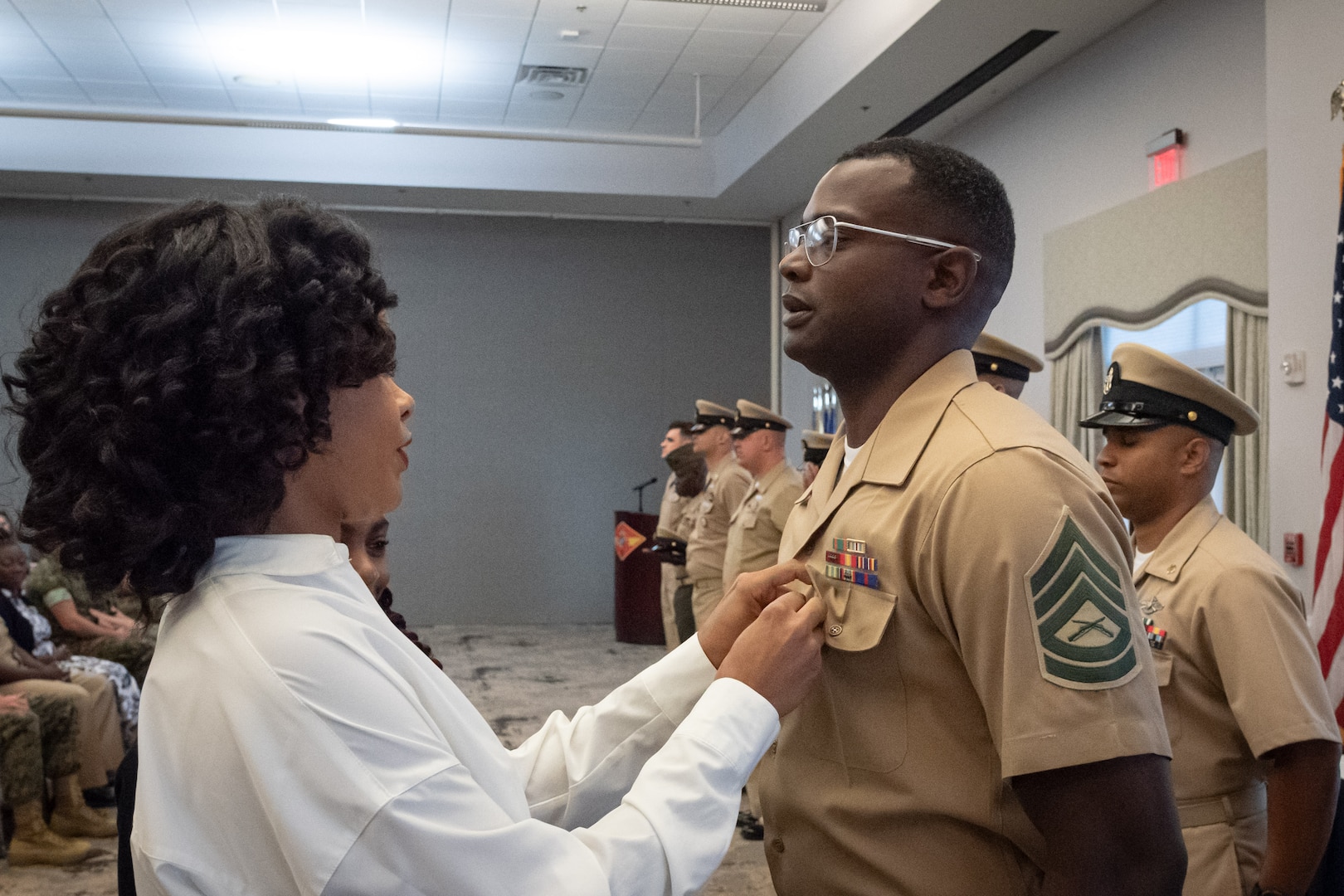 Gunnery Sgt. Le’Andrew McCoy receives the Chief Petty Officer’s rank insignia to recognize his earning of the honorary title of “Chief” during a ceremony held Tuesday, September 16, 2025 aboard Marine Corps Air Station Cherry Point.  
Seven Sailors promoted to the rank of Chief Petty Officer while McCoy and another Marine earned the honorary title. Marines, whose rank structure differs from the Navy’s, receive the honorary title in recognition of their leadership and alignment with Navy traditions.  While not authorized to wear the Chief Petty Officer’s Anchor outwardly on their uniforms, honorary Chiefs carry the distinction and professional development earned with it.