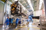 The Robotic Servicing of Geosynchronous Satellites (RSGS) payload integrated with the Northrop Grumman Mission Robotics Vehicle (MRV) spacecraft bus moves into the cryogenic thermal vacuum chamber for testing at the U.S. Naval Research Laboratory’s (NRL) Naval Center for Space Technology (NCST) in Washington, D.C., July 24, 2025. NRL NCST, with funding support from the Defense Advanced Research Projects Agency (DARPA), is conducting final space-readiness testing on RSGS, a robotic payload designed to extend and upgrade satellites already in orbit.