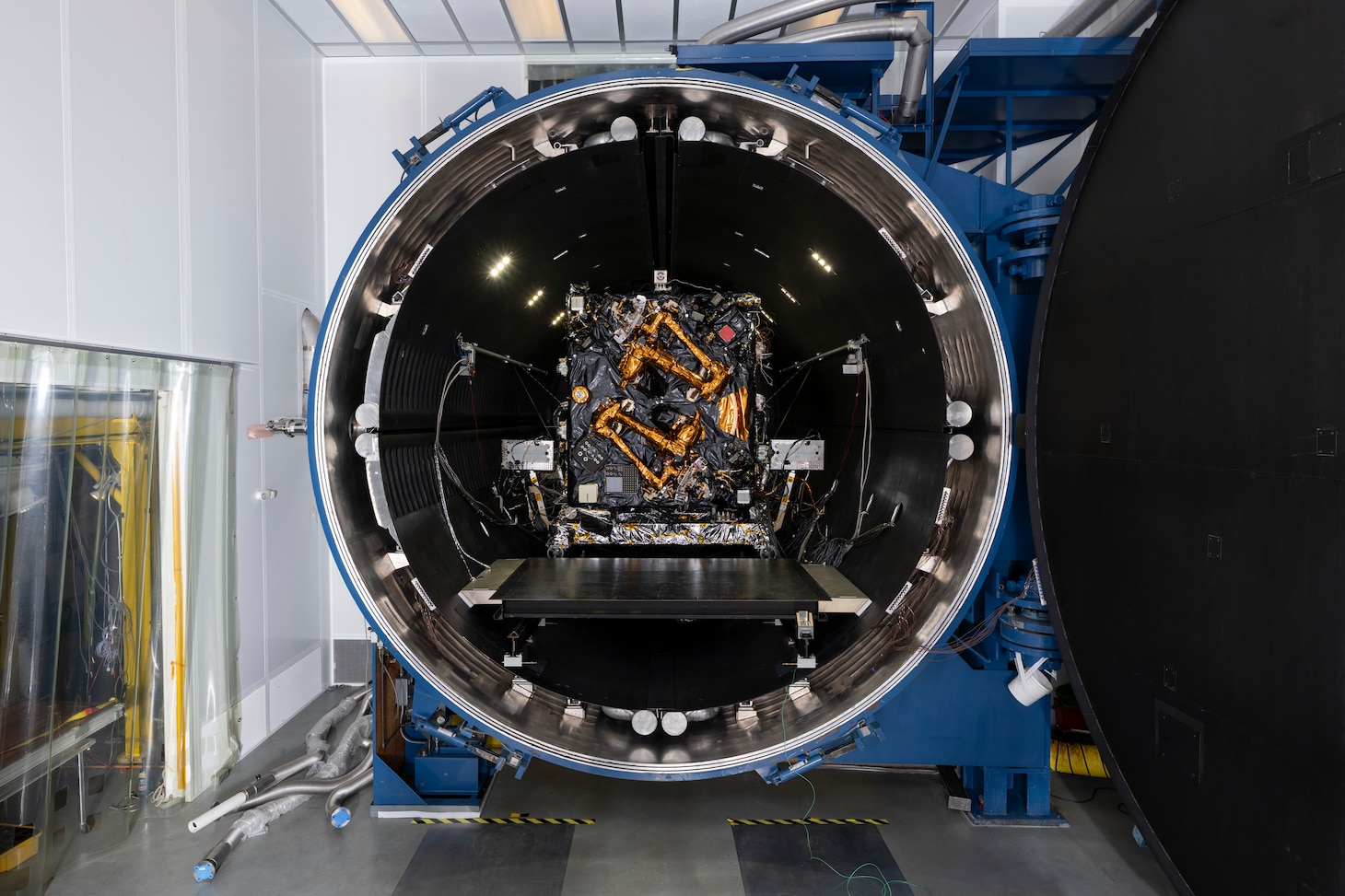 The Robotic Servicing of Geosynchronous Satellites (RSGS) payload integrated with the Northrop Grumman Mission Robotics Vehicle (MRV) spacecraft bus sits in the cryogenic thermal vacuum chamber for testing at the U.S. Naval Research Laboratory’s (NRL) Naval Center for Space Technology (NCST) in Washington, D.C., July 28, 2025. NRL NCST, with funding support from the Defense Advanced Research Projects Agency (DARPA), is conducting final space-readiness testing on RSGS, a robotic payload designed to extend and upgrade satellites already in orbit.
