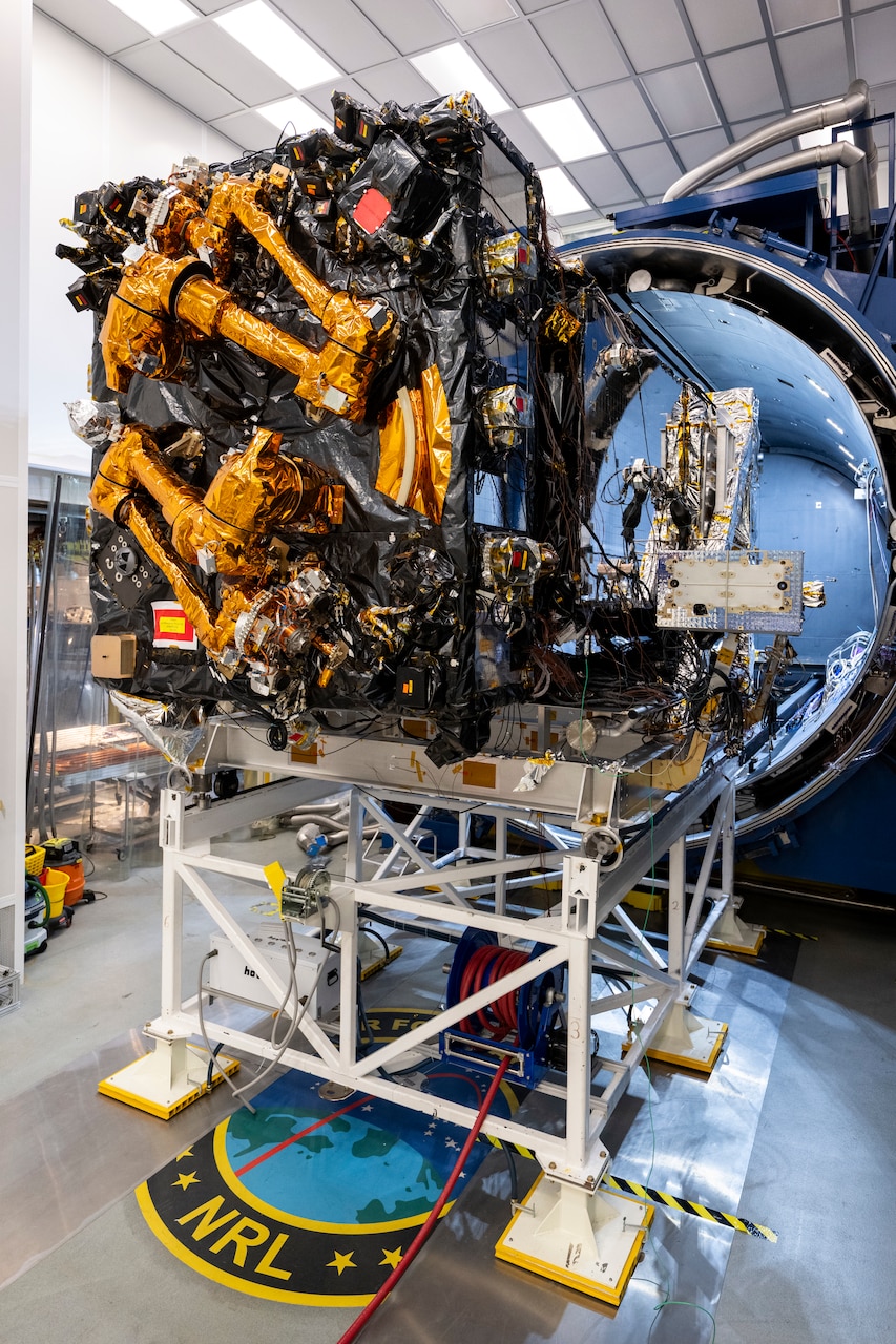 The Robotic Servicing of Geosynchronous Satellites (RSGS) payload integrated with the Northrop Grumman Mission Robotics Vehicle (MRV) spacecraft bus sits outside the cryogenic thermal vacuum chamber after completing testing at the U.S. Naval Research Laboratory’s (NRL) Naval Center for Space Technology (NCST) in Washington, D.C., Sept. 3, 2025. NRL NCST, with funding support from the Defense Advanced Research Projects Agency (DARPA), is conducting final space-readiness testing on RSGS, a robotic payload designed to extend and upgrade satellites already in orbit.