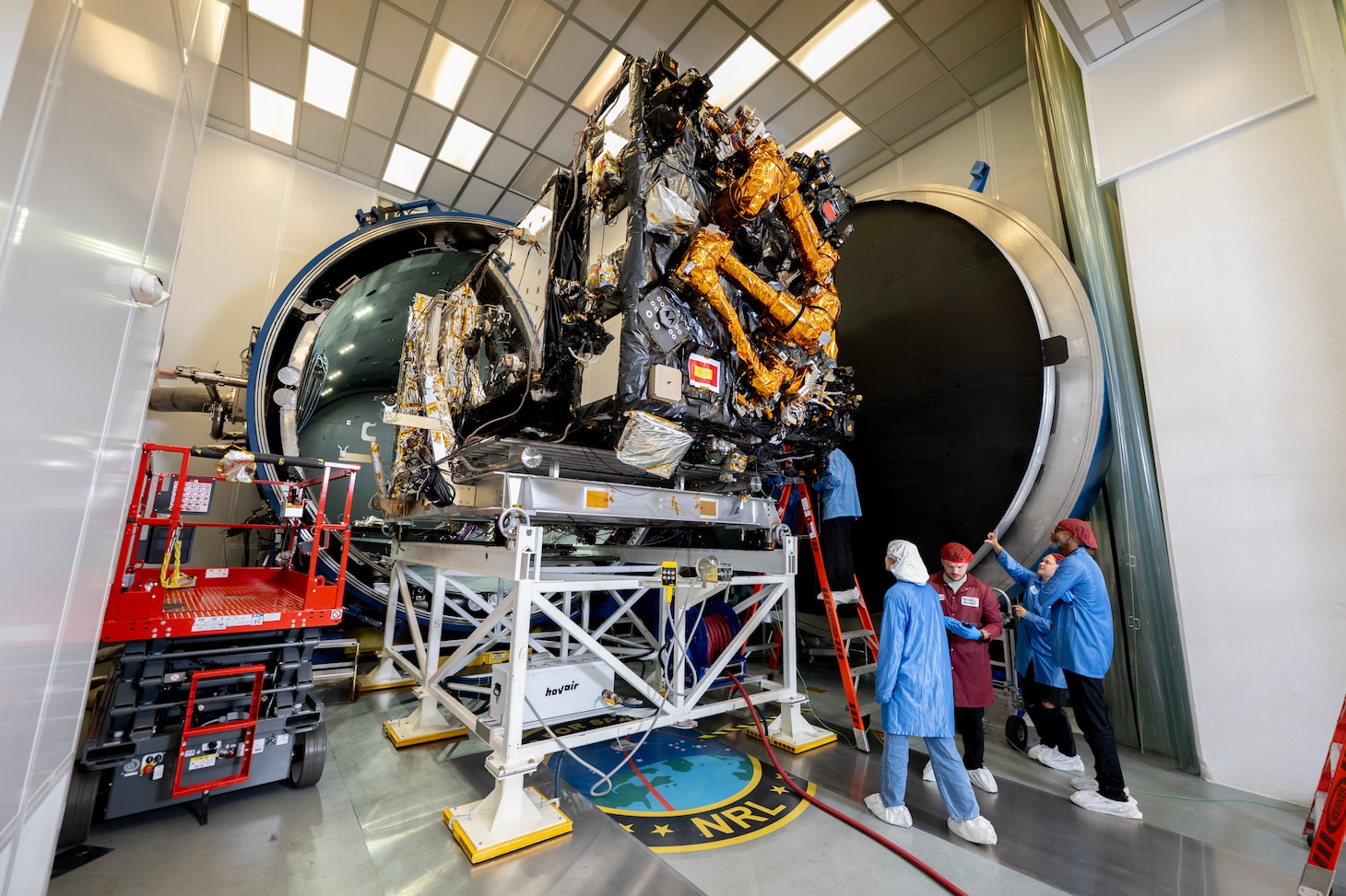 The Robotic Servicing of Geosynchronous Satellites (RSGS) payload integrated with the Northrop Grumman Mission Robotics Vehicle (MRV) spacecraft bus sits outside the cryogenic thermal vacuum chamber after completing testing at the U.S. Naval Research Laboratory’s (NRL) Naval Center for Space Technology (NCST) in Washington, D.C., Sept. 4, 2025. NRL NCST, with funding support from the Defense Advanced Research Projects Agency (DARPA), is conducting final space-readiness testing on RSGS, a robotic payload designed to extend and upgrade satellites already in orbit.