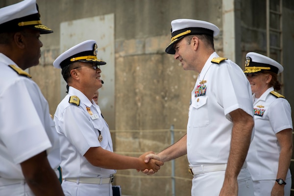 U.S. 7th Fleet Deputy Commander Rear Adm. Kyle Gantt, right, greets Republic of Korea Navy 2nd Fleet Deputy Commander Rear Adm. Lee Jae-seop during a welcoming ceremony for U.S. 7th Fleet flagship USS Blue Ridge (LCC 19) in Pyeongtaek, South Korea, Sept. 18, 2025.