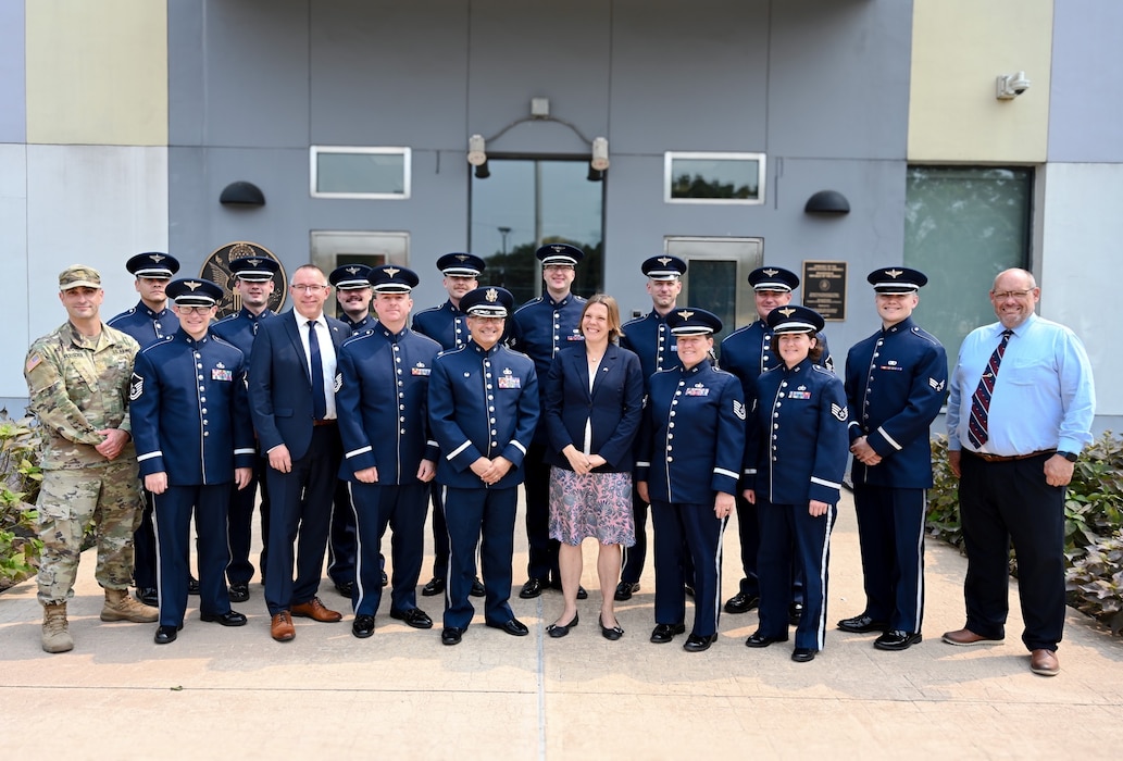 USAFE-AFAFRICA Band pose for a group photo with members of the at the U.S. Embassy in Brazzaville, Republic of the Congo