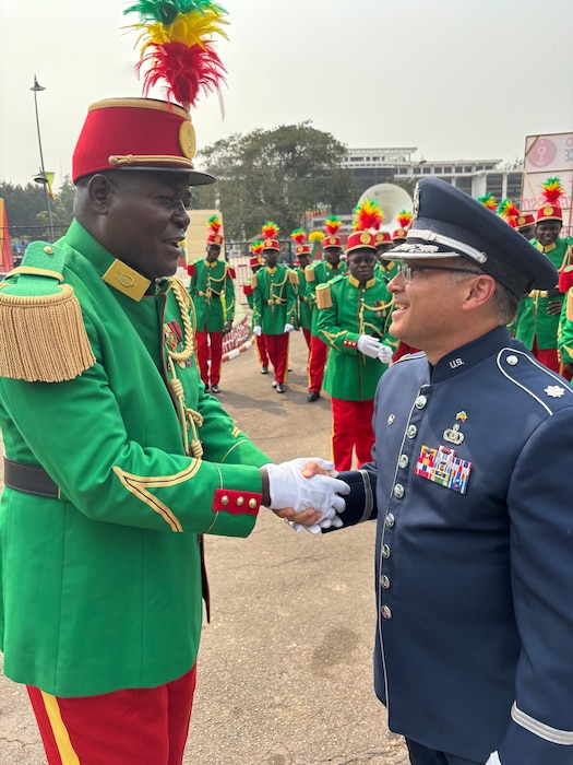 Commander shakes hands