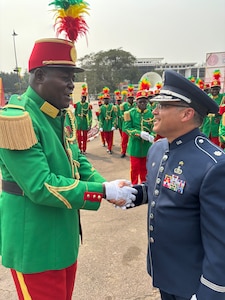 Commander shakes hands
