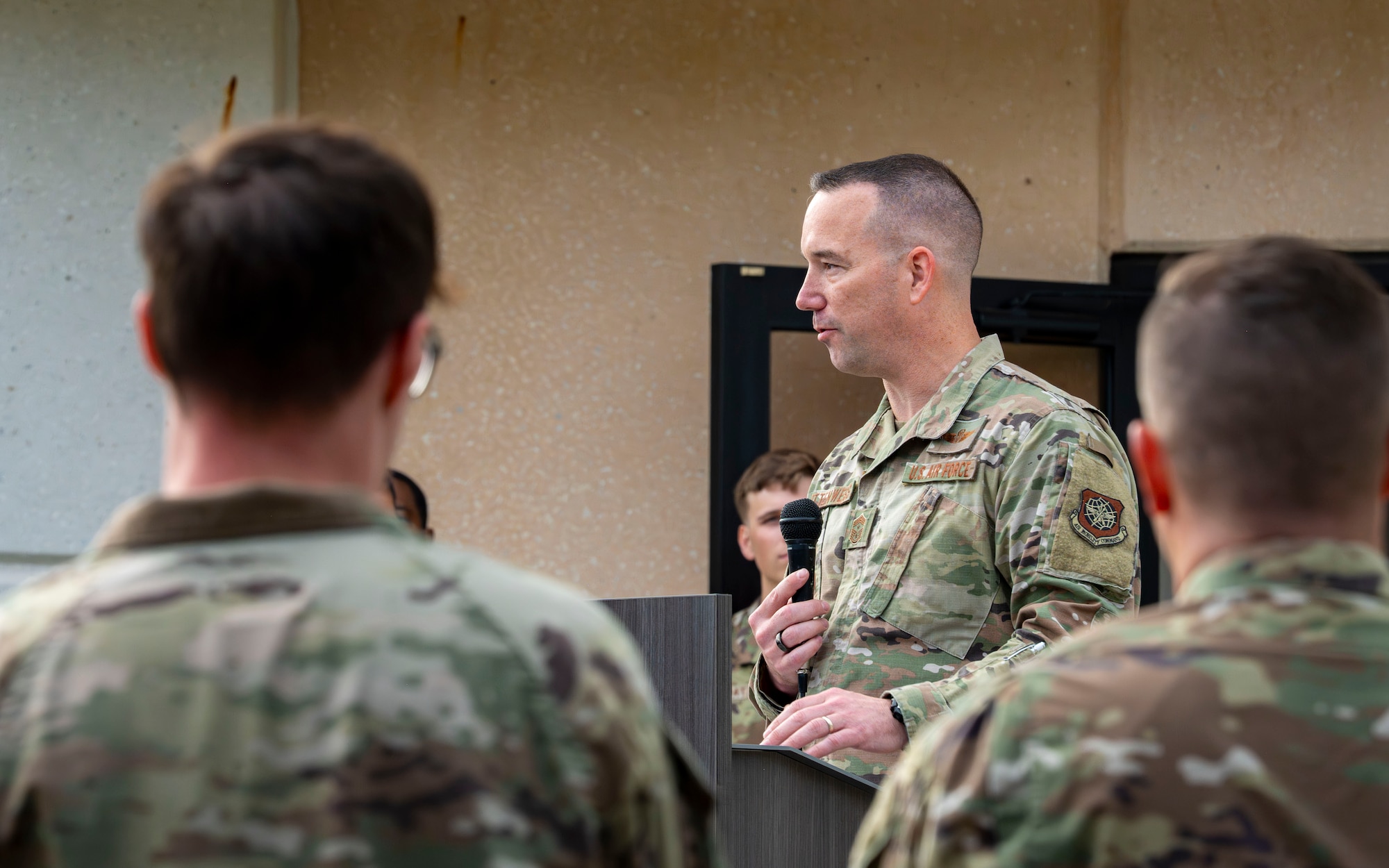 U.S. Air Force Chief Master Sgt. Christopher Ottenwess, 6th Air Refueling Wing command chief, gives opening remarks about the Sept. 11, 2001, terrorist attacks during a 9/11 Memorial Climb at MacDill Air Force Base, Florida, Sept. 11, 2025. Service members and Hillsborough County firefighters climbed nine flights of stairs 411 times to honor the 411 first responders who lost their lives during the terrorist attacks on the World Trade Center. (U.S. Air Force photo by Airman 1st Class Monique Stober)