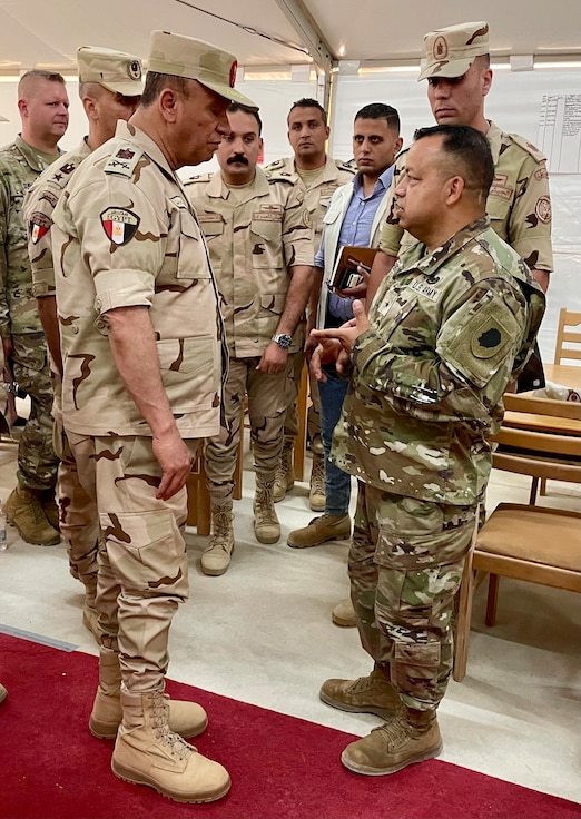 Illinois Army National Guard Brig. Gen. Jorge Fonseca, the Illinois National Guard Director of the Joint Staff, discusses Bright Star 25 with Egyptian Army Maj. Gen. Sherif Al-Araishi, the Director of the Military Training Authority on Sept. 3 prior to the Command Post Exercise (CPX) during Bright Star 25 at Mohamed Naguib Military Base, Egypt.