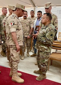 Illinois Army National Guard Brig. Gen. Jorge Fonseca, the Illinois National Guard Director of the Joint Staff, discusses Bright Star 25 with Egyptian Army Maj. Gen. Sherif Al-Araishi, the Director of the Military Training Authority on Sept. 3 prior to the Command Post Exercise (CPX) during Bright Star 25 at Mohamed Naguib Military Base, Egypt.