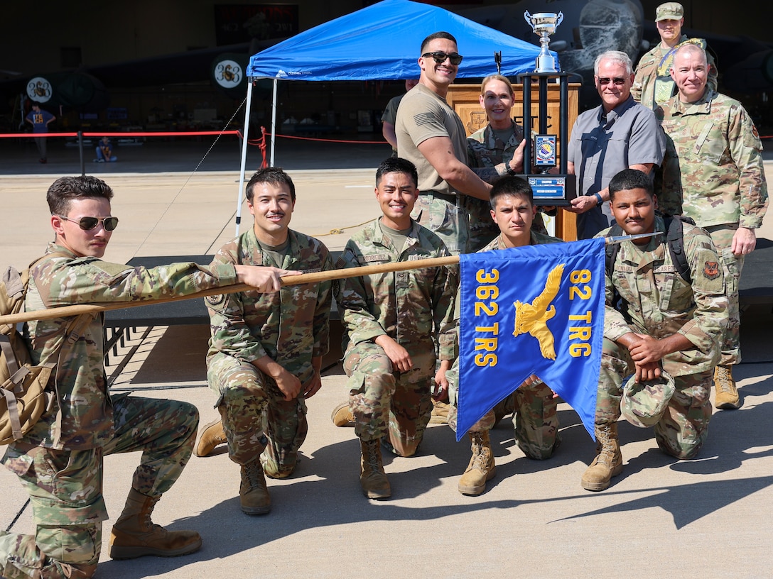 U.S. Air Force Airmen in Training, assigned to the 362 Training Squadron, pose for a photo after winning the Bracer Forge Trophy during an exercise at Sheppard Air Force Base, Texas, Sept. 11, 2025.