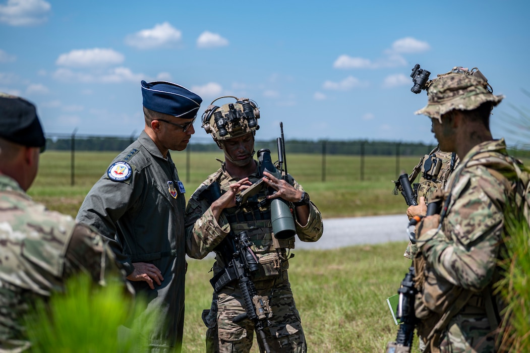 Tactical Air Control Party (TACP) airmen assigned to the 15th Air Support Operations Squadron provide a mission brief to Gen. Adrian Spain, commander of Air Combat Command, and Chief Master Sgt. Jeremy Unterseher, ACC command chief, at Moody Air Force Base, Georgia, Sept. 16, 2025. TACPs execute the kill chain through forward, agile command and control, joint integration, and precision strike coordination. (U.S. Air Force photo by Senior Airman Leonid Soubbotine)