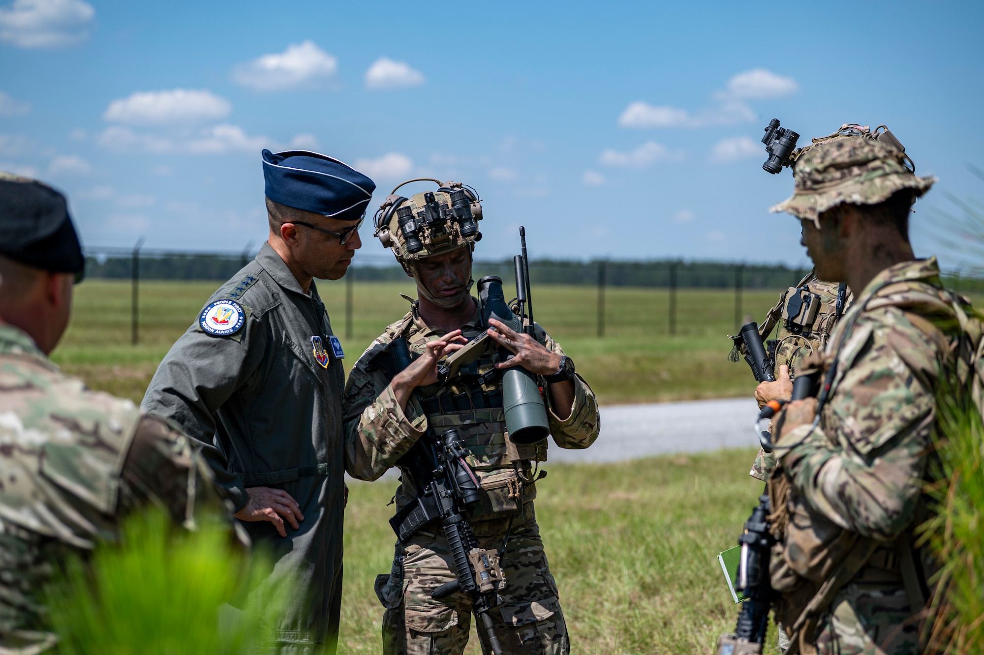 Tactical Air Control Party (TACP) airmen assigned to the 15th Air Support Operations Squadron provide a mission brief to Gen. Adrian Spain, commander of Air Combat Command, and Chief Master Sgt. Jeremy Unterseher, ACC command chief, at Moody Air Force Base, Georgia, Sept. 16, 2025. TACPs execute the kill chain through forward, agile command and control, joint integration, and precision strike coordination. (U.S. Air Force photo by Senior Airman Leonid Soubbotine)