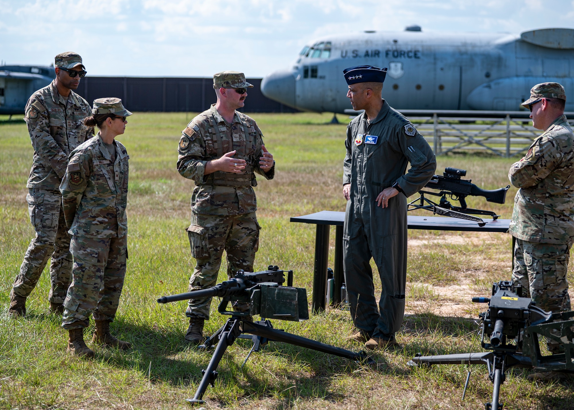 Airmen from the 820th Base Defense Group weapons flight go over a weapon system during a demonstration for Gen. Adrian Spain, commander of Air Combat Command, and Chief Master Sgt. Jeremy Unterseher, ACC command chief, at Moody Air Force Base, Georgia, Sept. 16, 2025. The 820th BDG is uniquely structured to provide full-spectrum base defense capabilities in contested environments using a wide scope of weapon platforms. (U.S. Air Force photo by Senior Airman Leonid Soubbotine)