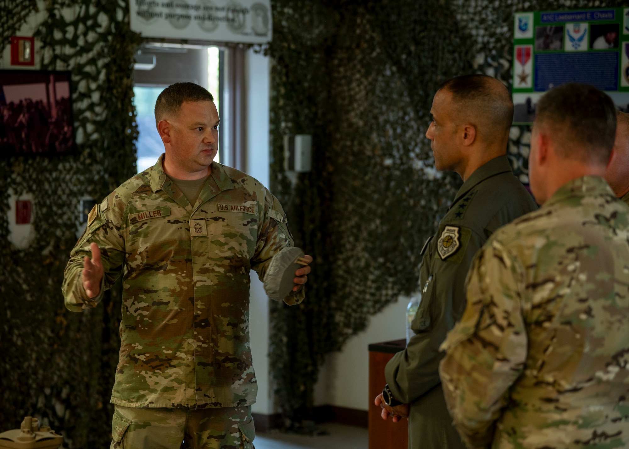 Gen. Adrian Spain, commander of Air Combat Command, listens to a 93rd Air Ground Operations Wing combat weather airman go over the sensor equipment used to measure and communicate real-time weather data at Moody Air Force Base, Georgia, Sept. 16, 2025. Weather Airmen provide critical meteorological and environmental information to support joint forces in contested environments. (U.S. Air Force photo by Senior Airman Leonid Soubbotine)