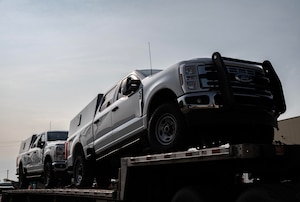 Up-armored Ford F-350s are delivered to Minot Air Force Base, North Dakota, Sept. 8, 2025. To enhance safety, efficiency and sustainability for defenders, the installation is set to receive these vehicles over the next two years as part of the phased replacement of Bearcats and Humvees. (U.S. Air Force photo by Senior Airman Alyssa Bankston)