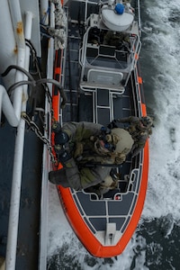Members of a U.S. East Coast-based Naval Special Warfare Operator (SEAL) team and the U.S. Coast Guard Maritime Security Response Team (MSRT) West conduct a visit, board, search, and seizure (VBSS) training aboard the National Oceanic and Atmospheric Administration Ship (NOAA) Fairweather (S 220)