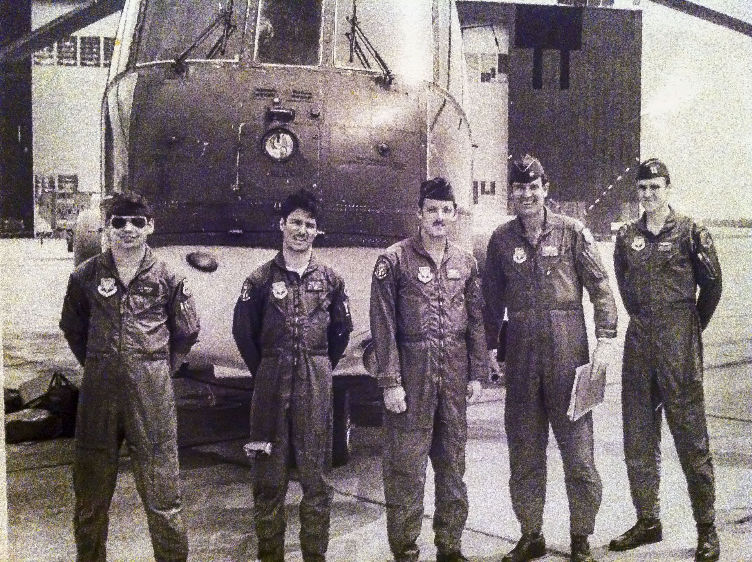 U.S. Air Force Senior Airman Karl McGregor, second from left, poses with his squadron commander, fourth from left, and fellow Airmen at Shaw Air Force Base, S.C., in 1978. McGregor served as a flight engineer aboard the CH-3 Jolly Green Giant helicopter, supporting tactical airlift and rescue missions during his early career. (Courtesy photo from McGregor)