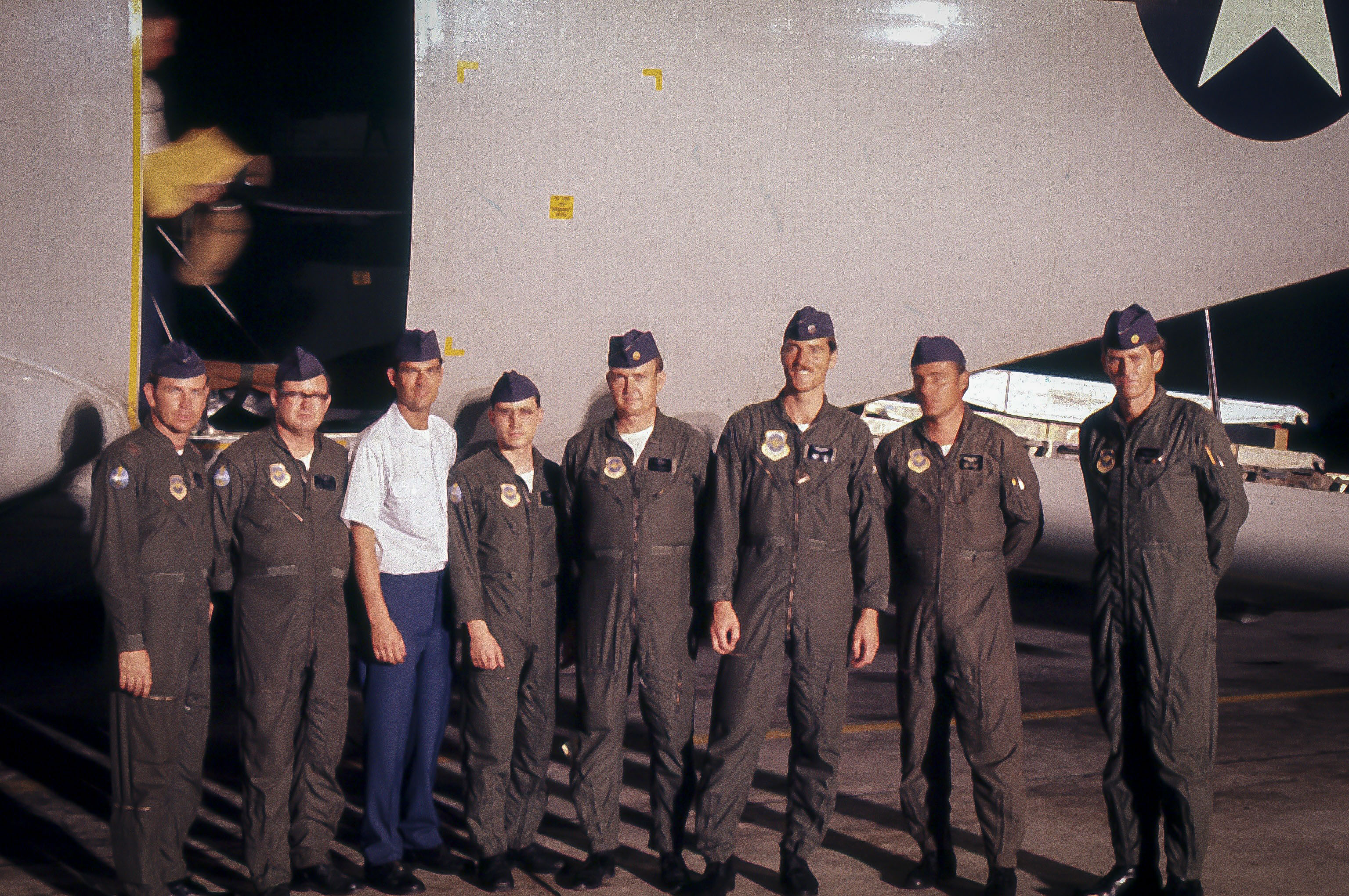 Retired U.S. Air Force Col. Steve Wilkerson stands with fellow Air Force crew members at Clark Air Base, Philippines, March 14, 1973, following a repatriation flight from Hanoi. The crew had just transported American prisoners of war for medical processing, rest, and their first hot meals in sometime as part of Operation Homecoming, which marked the return of U.S. servicemembers held captive during the Vietnam War. (Courtesy photo from Wilkerson)