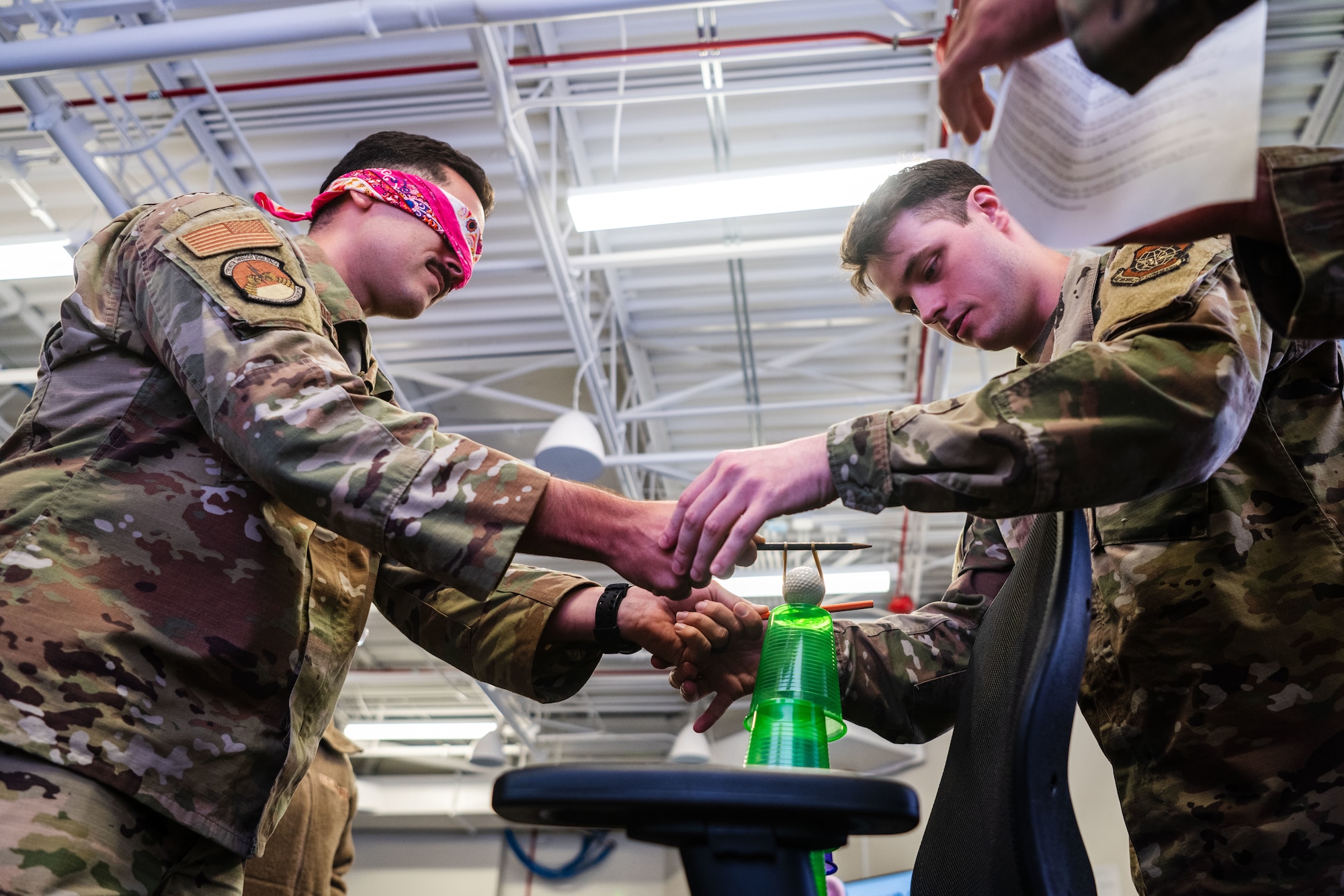Airman Leadership School Class 25-F students complete team building exercises at MacDill Air Force Base, Florida, Sept. 2, 2025. ALS students undergo a series of team building exercises intended to demonstrate the value of networking, promote interpersonal communication skills and reinforce mission command principles. (U.S. Air Force photo by Senior Airman Zachary Foster)