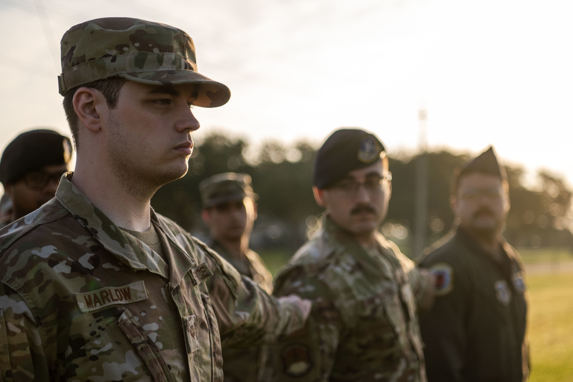 U.S. Air Force Senior Chase Marlow, Airman Leadership School Class 25-F student, stands in formation at MacDill Air Force Base, Florida, Sept. 2, 2025. ALS students performed reveille and retreat practices daily. The repetition allowed students to embody the Air Force’s core values while executing a long standing military tradition. (U.S. Air Force photo by Senior Airman Zachary Foster)