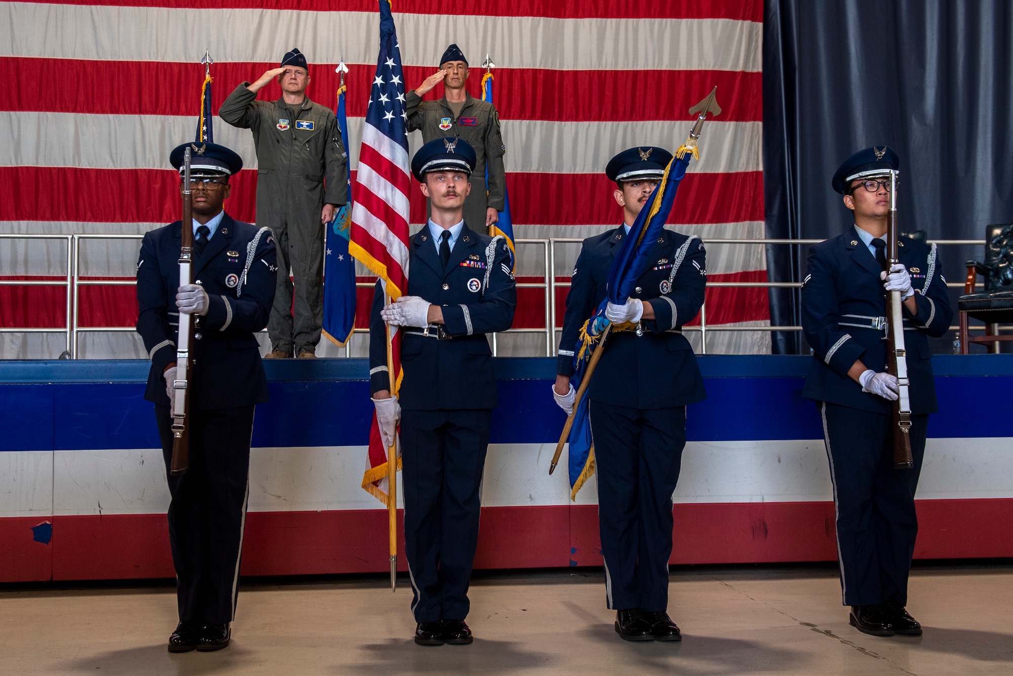 Members assigned to the 20th Fighter Wing Honor Guard present the colors during a wing redesignation ceremony at Shaw Air Force Base, South Carolina, Sept. 18, 2025.