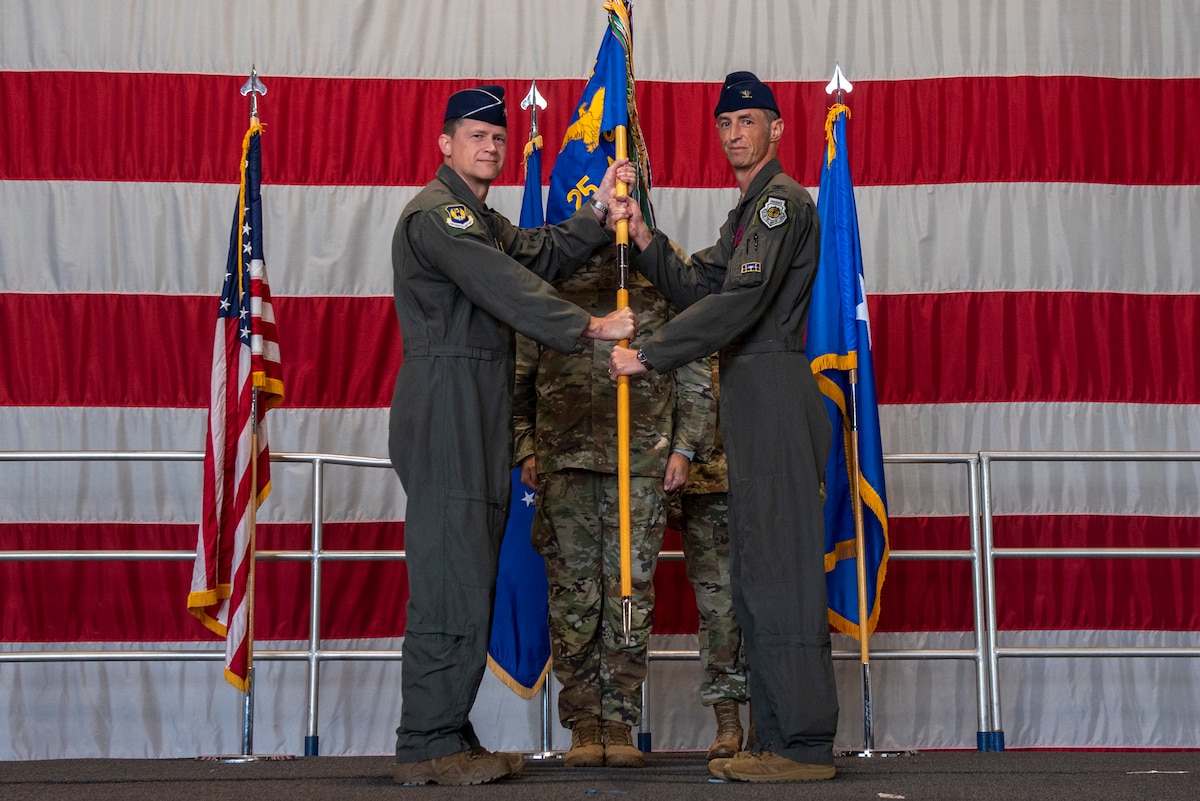 U.S. Air Force Col. Brad Howell, 25th Attack Wing commander, assumes command during a wing redesignation ceremony at Shaw Air Force Base, South Carolina, Sept. 18, 2025.
