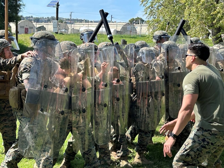 U.S. Marines with Detachment 1, Headquarters Company, 4th Law Enforcement

Battalion, Force Headquarters Group, Marine Forces Reserve, conduct riot control

training at Marine Corps Base Camp Pendleton, California, April 13, 2025. During the exercise, trainees attempted to penetrate the formation while Marines practiced tactics to maintain order and de-escalate potentially hostile situations. (Courtesy photo)