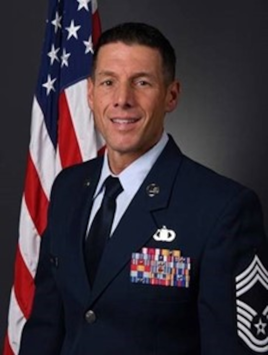 U.S. Air Force Chief Master Sgt. Charles Hansel, command chief of the 178th Wing, poses for a portrait.