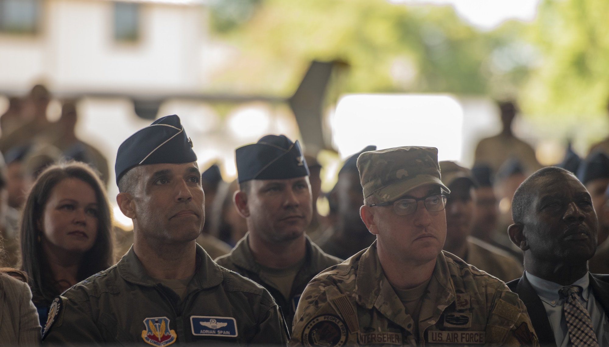 Gen. Adrian L. Spain, commander of Air Combat Command, and Chief Master Sgt. Jeremy Unterseher,  ACC command chief, attend a redesignation ceremony for the 25th Attack Wing at Shaw Air Force Base, South Carolina, Sept. 18, 2025. The 25th ATKW, previously the 25th Attack Group, operates globally 24/7/365, supporting four different combatant commands with the MQ-9 Reaper, a Remotely Piloted Aircraft capable of intelligence, surveillance and reconnaissance as well as precision strike. (U.S. Air Force photo by Senior Airman Kylie Barrow)