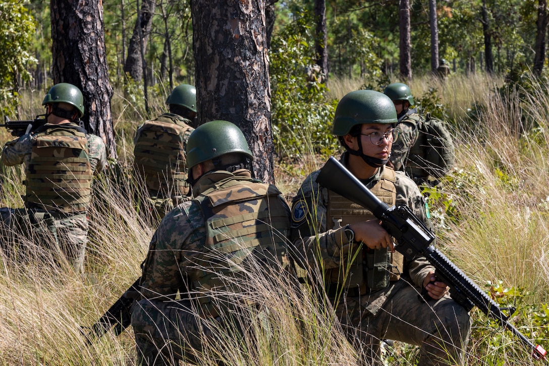 Marines with Corpo de Fuzileiros Navais (Brazilian marine corps) conduct patrol lane training during exercise UNITAS 2025 at Marine Corps Base Camp Lejeune, North Carolina, Sept. 17, 2025. UNITAS, which is Latin for “unity,” was conceived in 1959 and has taken place annually since first conducted in 1960. This year marks the 66th iteration of the world’s longest running annual multinational maritime exercise. (U.S. Marine Corps photo by Lance Cpl. Payton Goodrich)