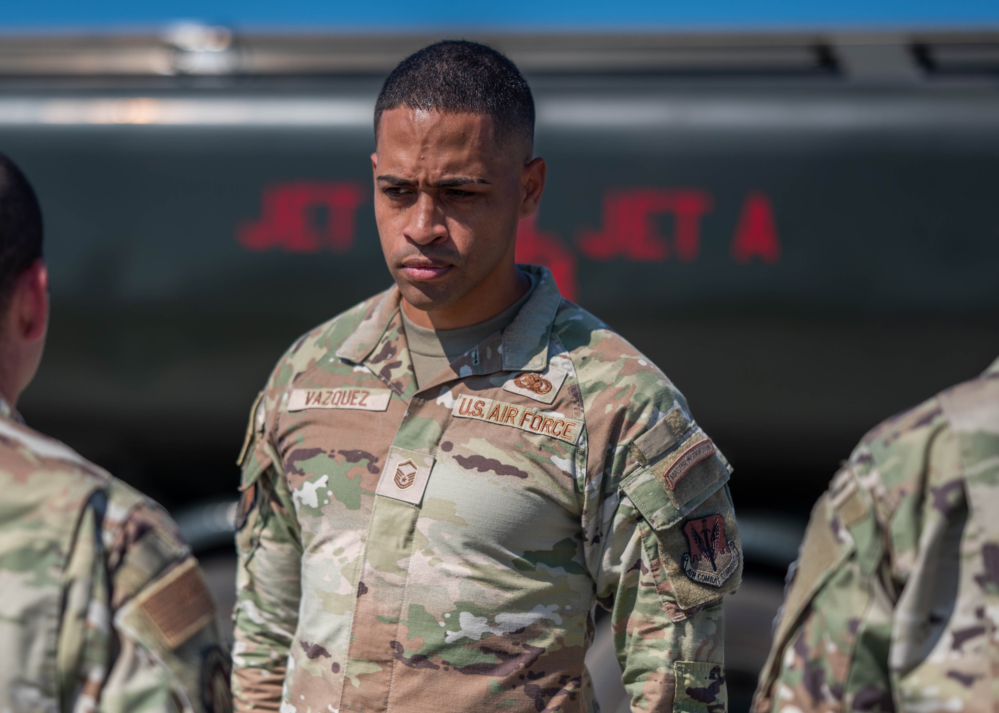 U.S. Air Force Master Sgt. Brandon Vazquez, 325th Logistics Readiness Squadron Petroleum, Oils and Lubricants section chief, performs a uniform inspection