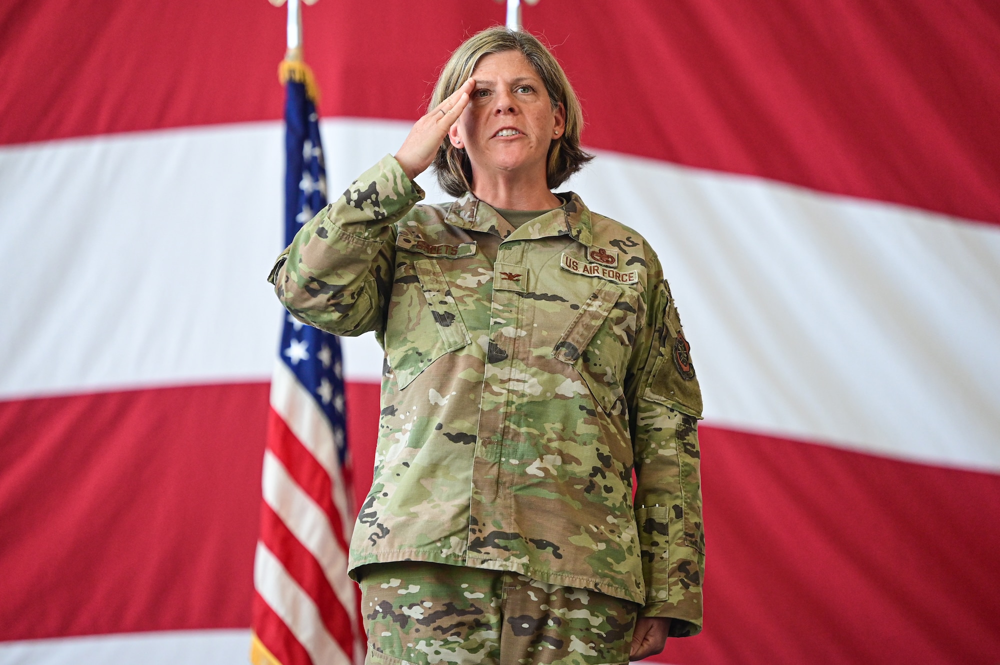 U.S. Air Force Col. Amanda Sheets, 19th Maintenance Group commander, renders a final salute during an inactivation ceremony at Little Rock Air Force Base, Arkansas, Sept. 18, 2025. Sheets provided leadership and training for more than 1,100 personnel who maintain Air Mobility Command’s 31 C-130J aircraft during her time as commander.