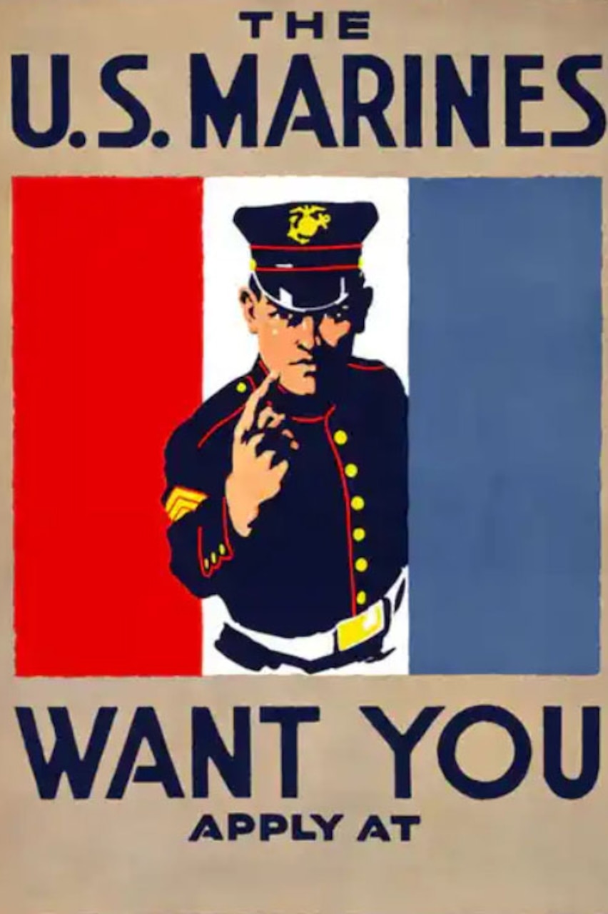 A Marine in dress blues points his finger, while a French flag is behind him.