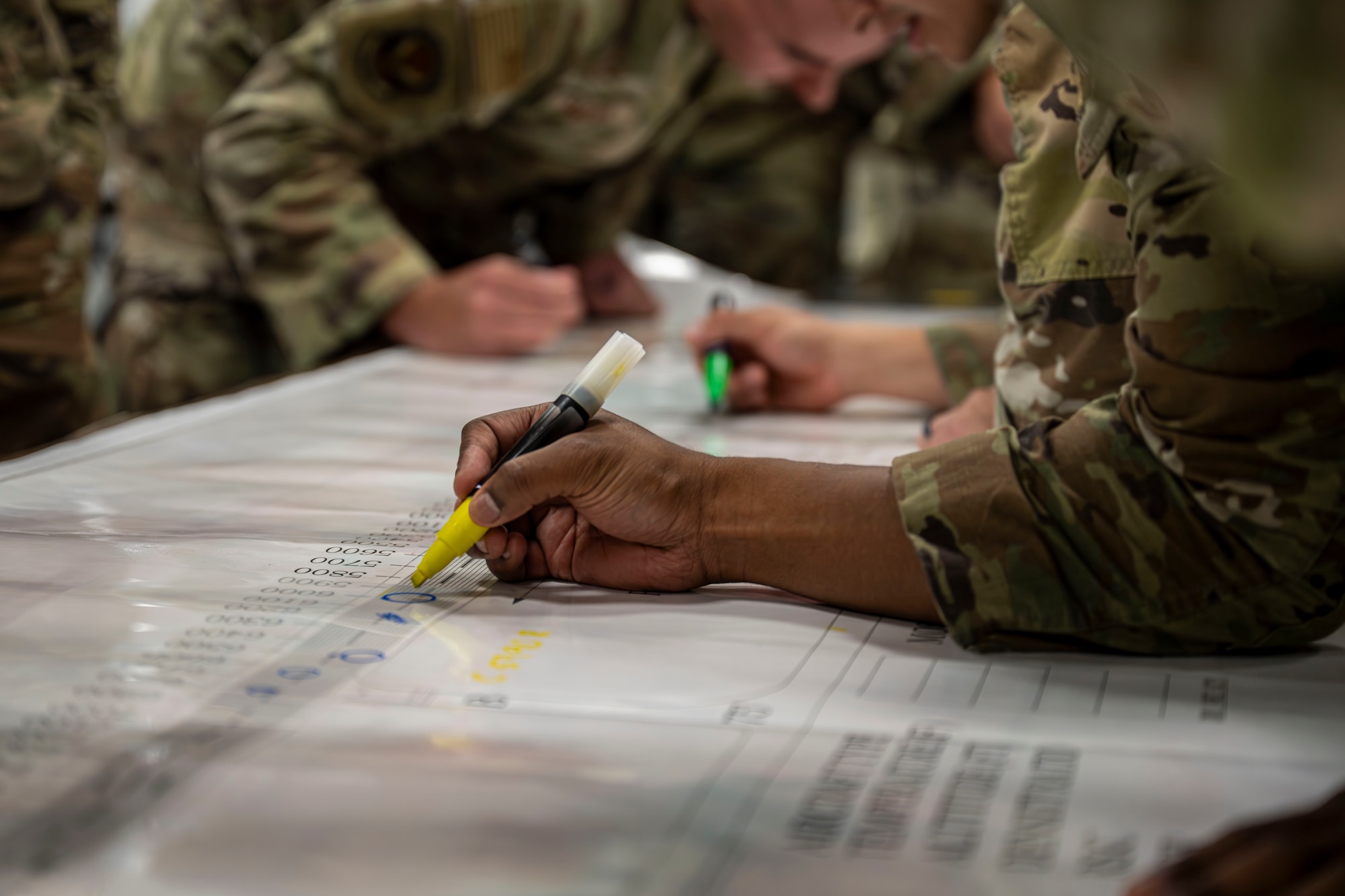 Airmen map out simulated airfield damage