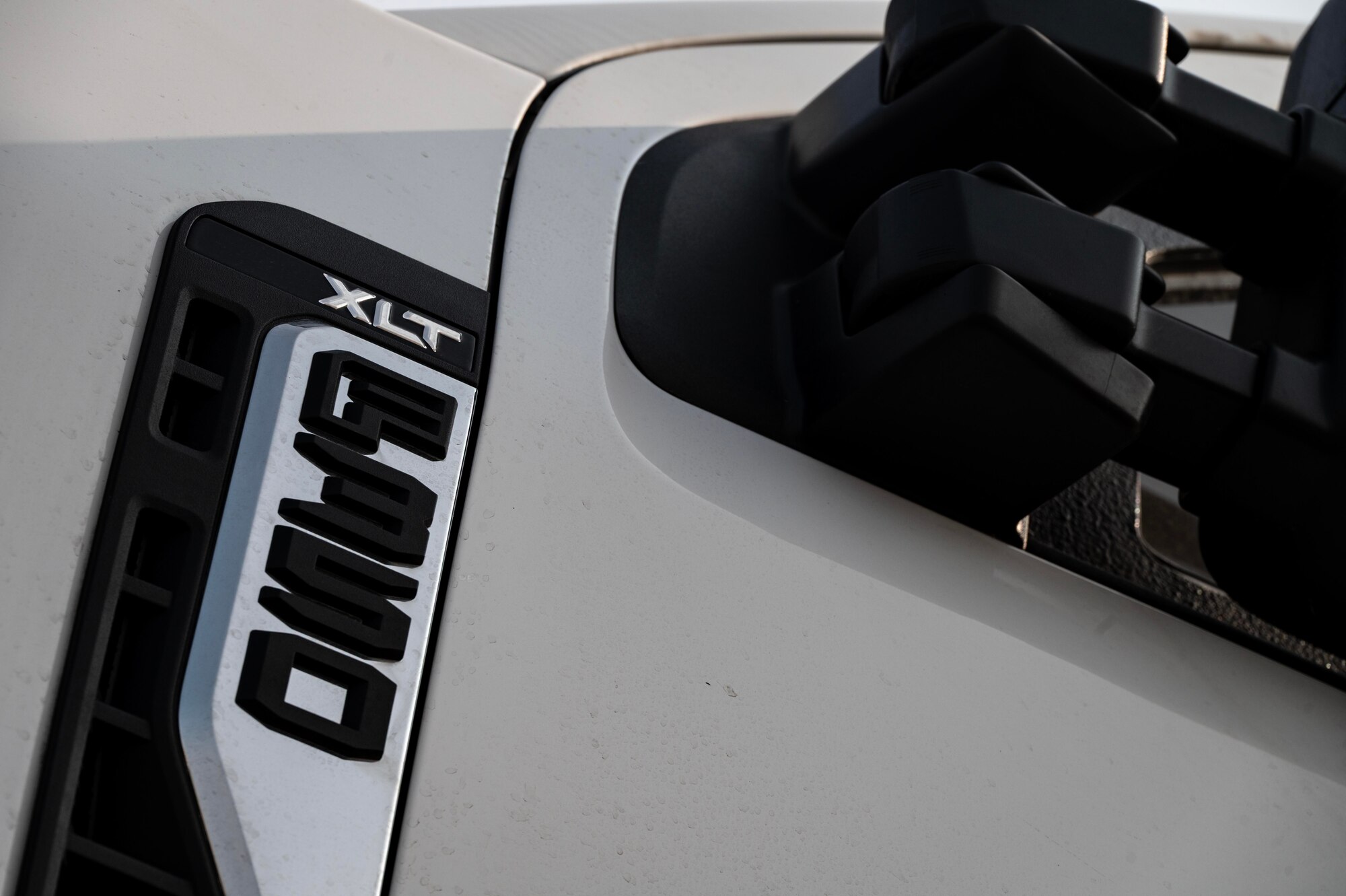 A new shipment of up-armored Ford F-350s arrives at Minot Air Force Base, North Dakota, Sept. 8, 2025. To enhance safety, efficiency and sustainability for defenders, the installation is set to receive these vehicles over the next two years as part of the phased replacement of Bearcats and Humvees. (U.S. Air Force photo by Senior Airman Alyssa Bankston)