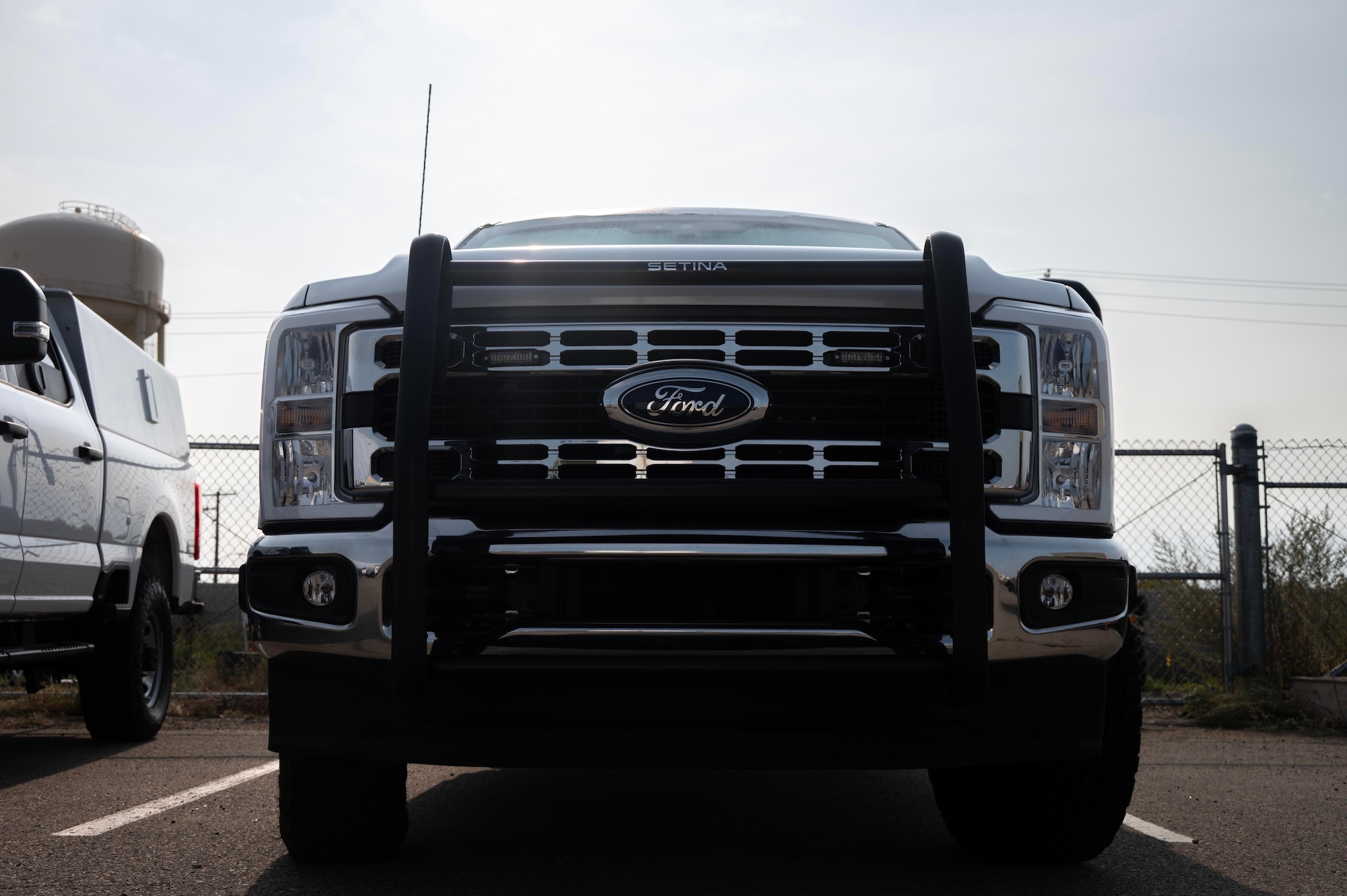 A new up-armored Ford F-350s is parked with the 5th Logistics Readiness Squadron vehicle fleet at Minot Air Force Base, North Dakota, Sept. 8, 2025. F-350s are being used to phase out the use of Bearcats and Humvees at Minot AFB marking a modernization effort aimed at enhancing safety, efficiency and sustainability for defenders. (U.S. Air Force photo by Senior Airman Alyssa Bankston)