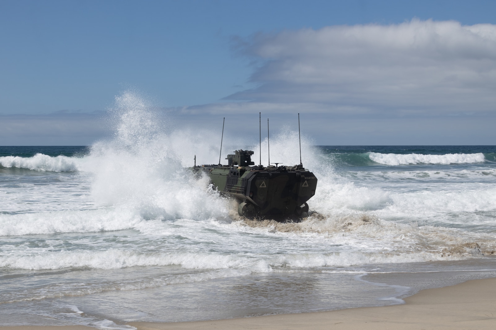 U.S. Marines assigned to 3rd Assault Amphibian Battalion, 1st Marine Division, operate an amphibious combat vehicle during surf transit operations at Marine Corps Base Camp Pendleton, California, Sept. 10, 2025. Surf transit operations are part of the ongoing, extensive ACV training necessary to ensure Marines are trained to safely operate and employ the ACV and AAVR-P7/A1 assault amphibious vehicle. (U.S. Marine Corps photo by Lance Cpl. Stella Tedesco)