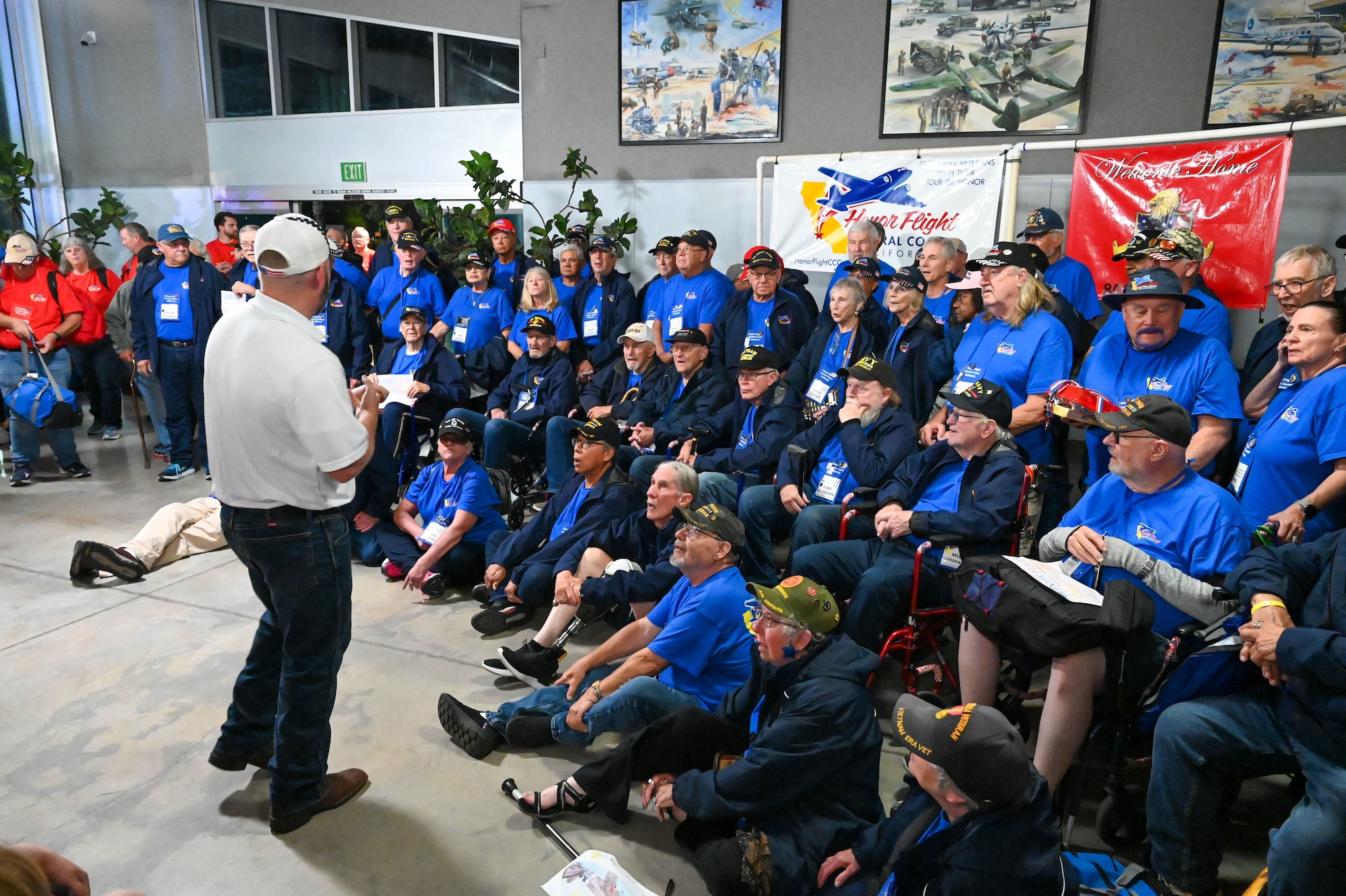 a man talks to a group of people