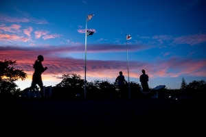 Volunteers participate in a Prisoners of War and Missing in Action (POW/MIA) memorial run.