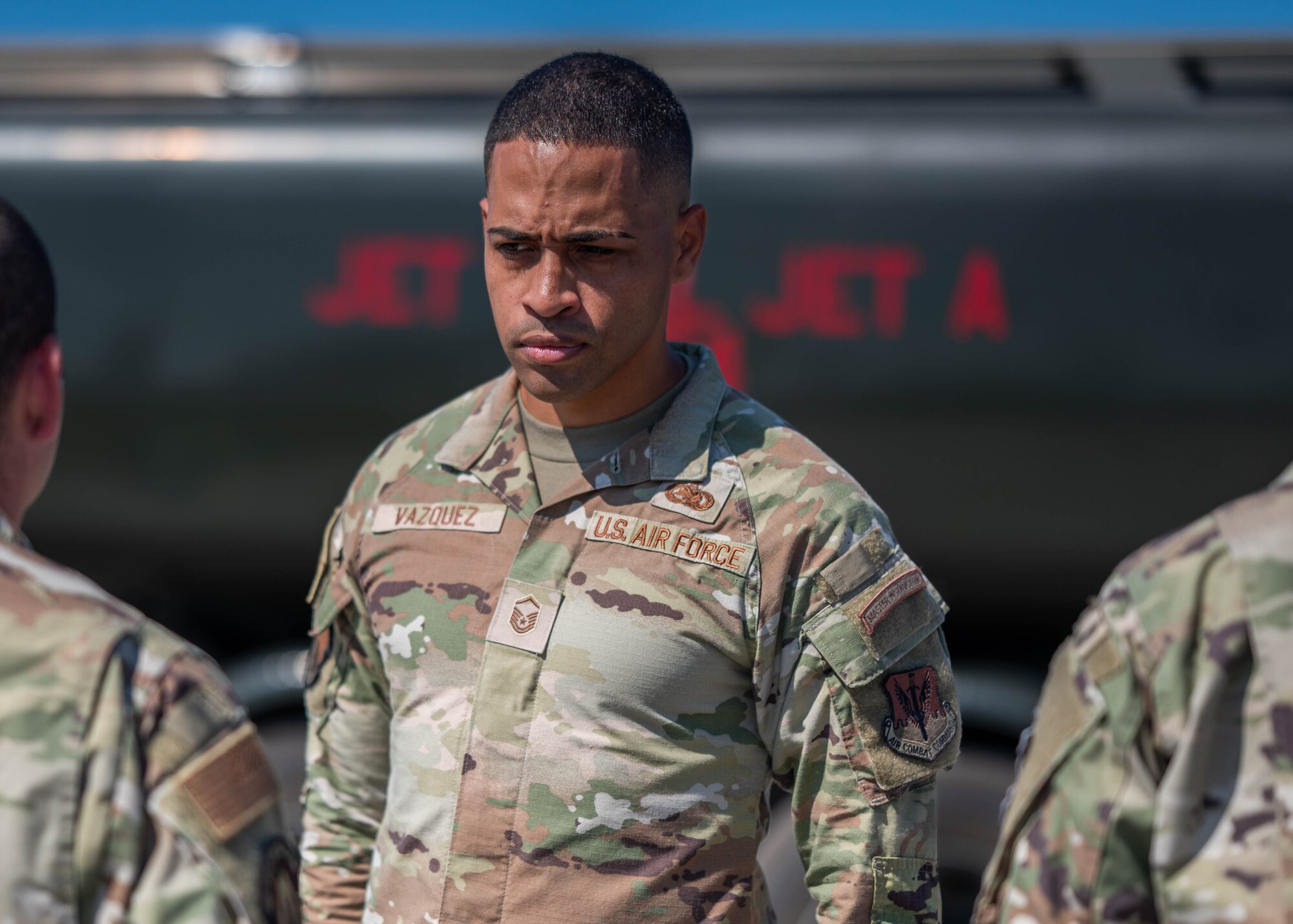 U.S. Air Force Master Sgt. Brandon Vazquez, 325th Logistics Readiness Squadron Petroleum, Oils and Lubricants section chief, performs a uniform inspection