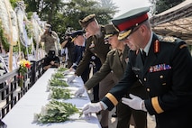 Canadian Armed Forces Lt. Gen. Derek Macaulay, deputy commander of United Nations Command, right, U.S. Marine Corps Maj. Gen. Valerie A. Jackson, commander of U.S. Marine Corps Forces Korea, center-right, U.S. Army Maj. Gen. William D. “Hank” Talyor, acting commander of Eighth Army, and other leaders place flowers down in honor of the fallen during a floral tribute event commemorating the 75th anniversary of the landing at Incheon, in Incheon, South Korea, Sept. 15, 2025. The commemoration honored the strategic success of the landing, which turned the tide of the Korean War, and paid tribute to the sacrifices made by Republic of Korea and United Nations Command Forces. (U.S. Marine Corps photo by Cpl. Simon Saravia)