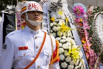A Republic of Korea Marine in the honor guard stands at attention during a floral tribute event commemorating the 75th anniversary of the landing at Incheon, in Incheon, South Korea, Sept. 15, 2025. The commemoration honored the strategic success of the landing, which turned the tide of the Korean War, and paid tribute to the sacrifices made by Republic of Korea and United Nations Command Forces. (U.S. Marine Corps photo by Cpl. Simon Saravia)