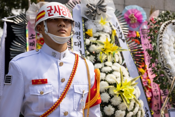 A Republic of Korea Marine in the honor guard stands at attention during a floral tribute event commemorating the 75th anniversary of the landing at Incheon, in Incheon, South Korea, Sept. 15, 2025. The commemoration honored the strategic success of the landing, which turned the tide of the Korean War, and paid tribute to the sacrifices made by Republic of Korea and United Nations Command Forces. (U.S. Marine Corps photo by Cpl. Simon Saravia)
