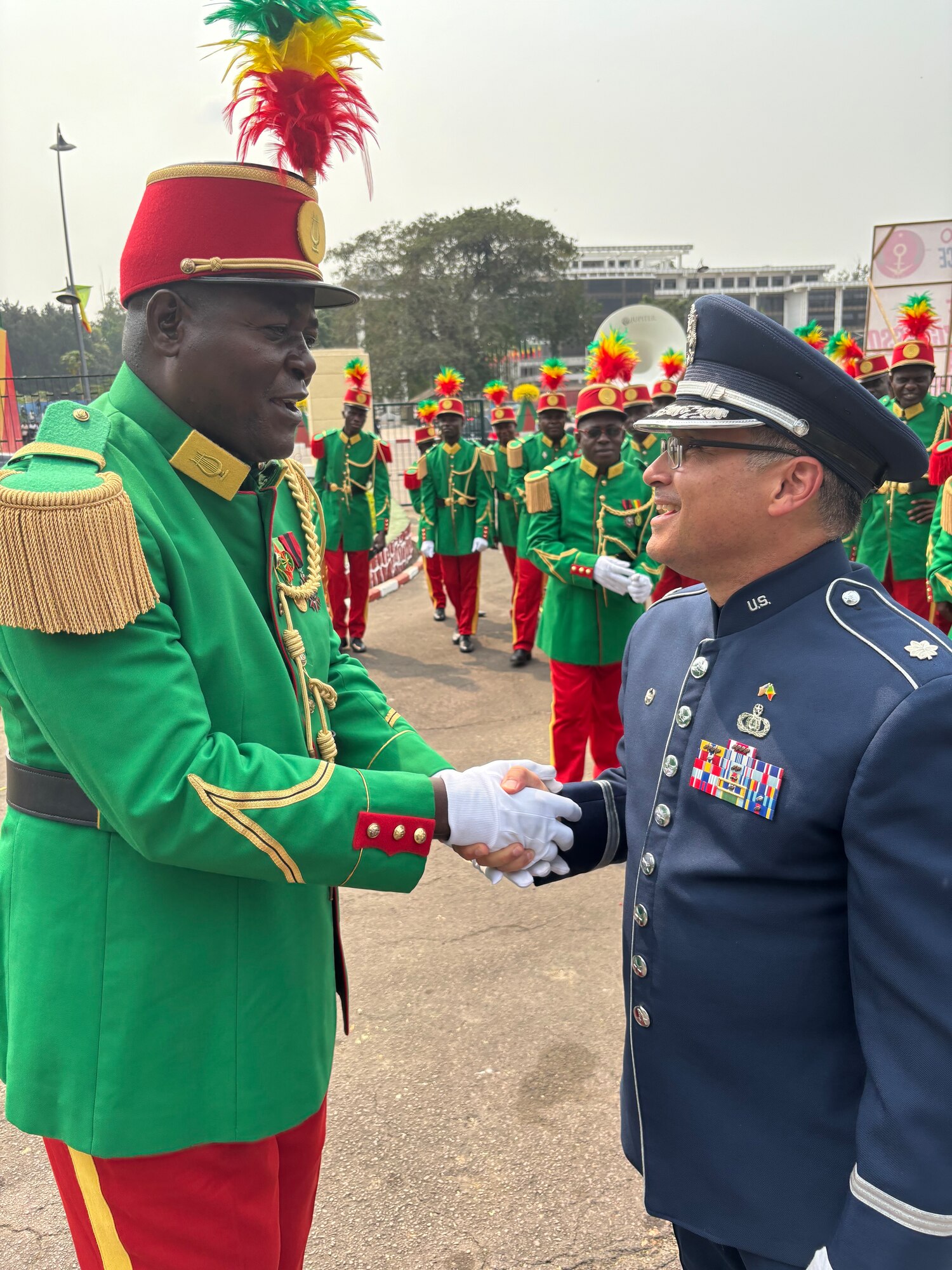 Commander shakes hands