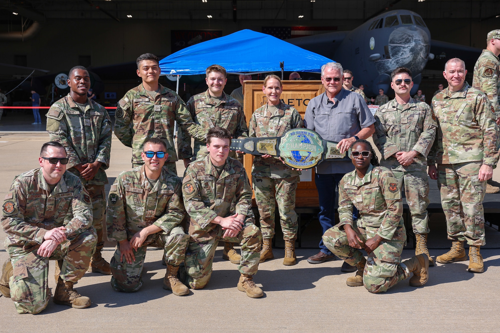 U.S. Air Force Airmen in Training, representing the F-15 Eagle generation team, pose for a photo after winning the Mission Generation Belt during a Bracer Forge exercise at Sheppard Air Force Base, Texas, Sept. 11, 2025.