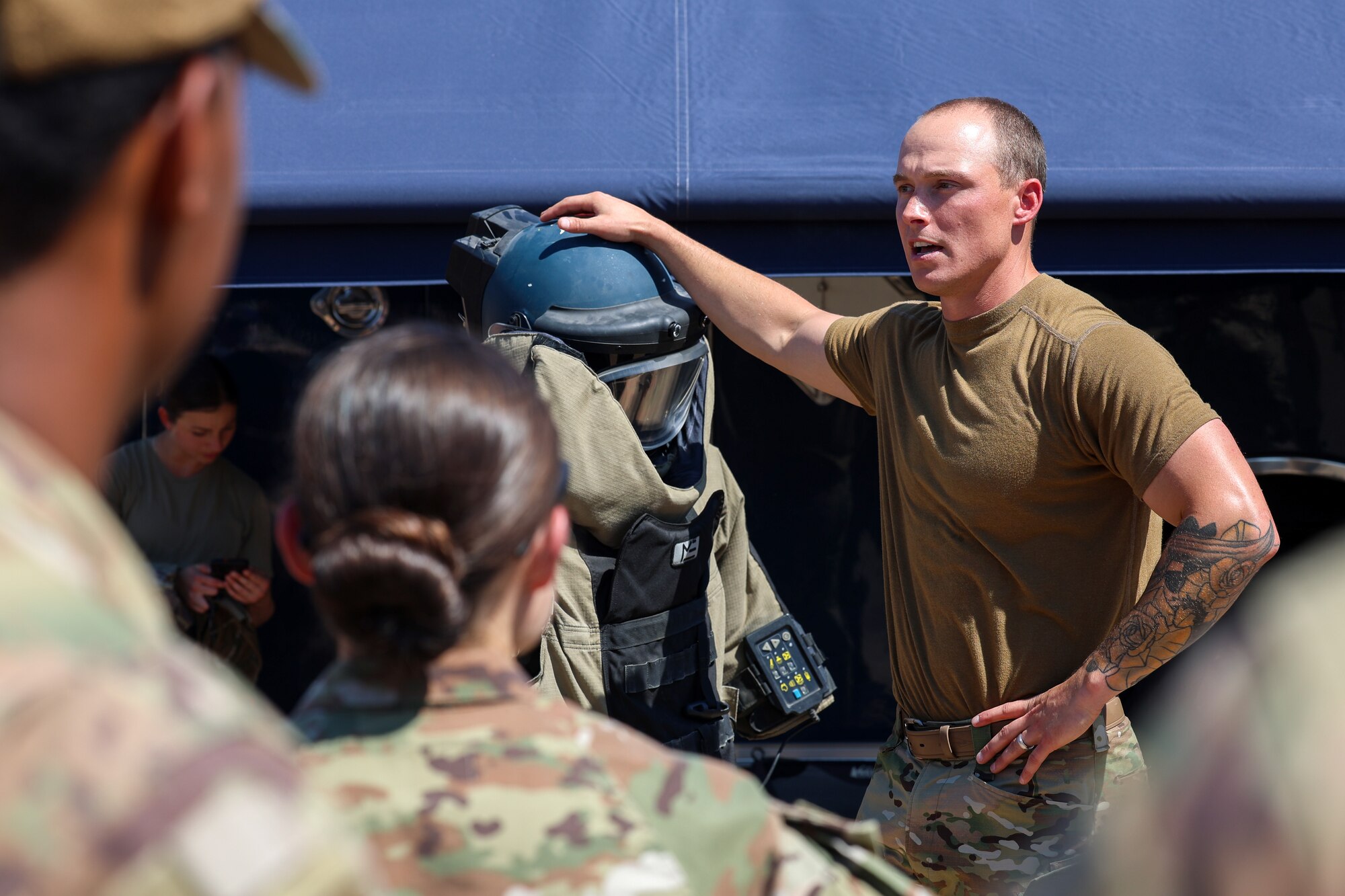 U.S. Air Force Tech Sgt. Ashton Flynt, 336 Training Squadron explosive ordinance disposal instructor, addresses a crowd of Airmen in Training and students during a Bracer Forge exercise at Sheppard Air Force Base, Texas, Sept. 11, 2025