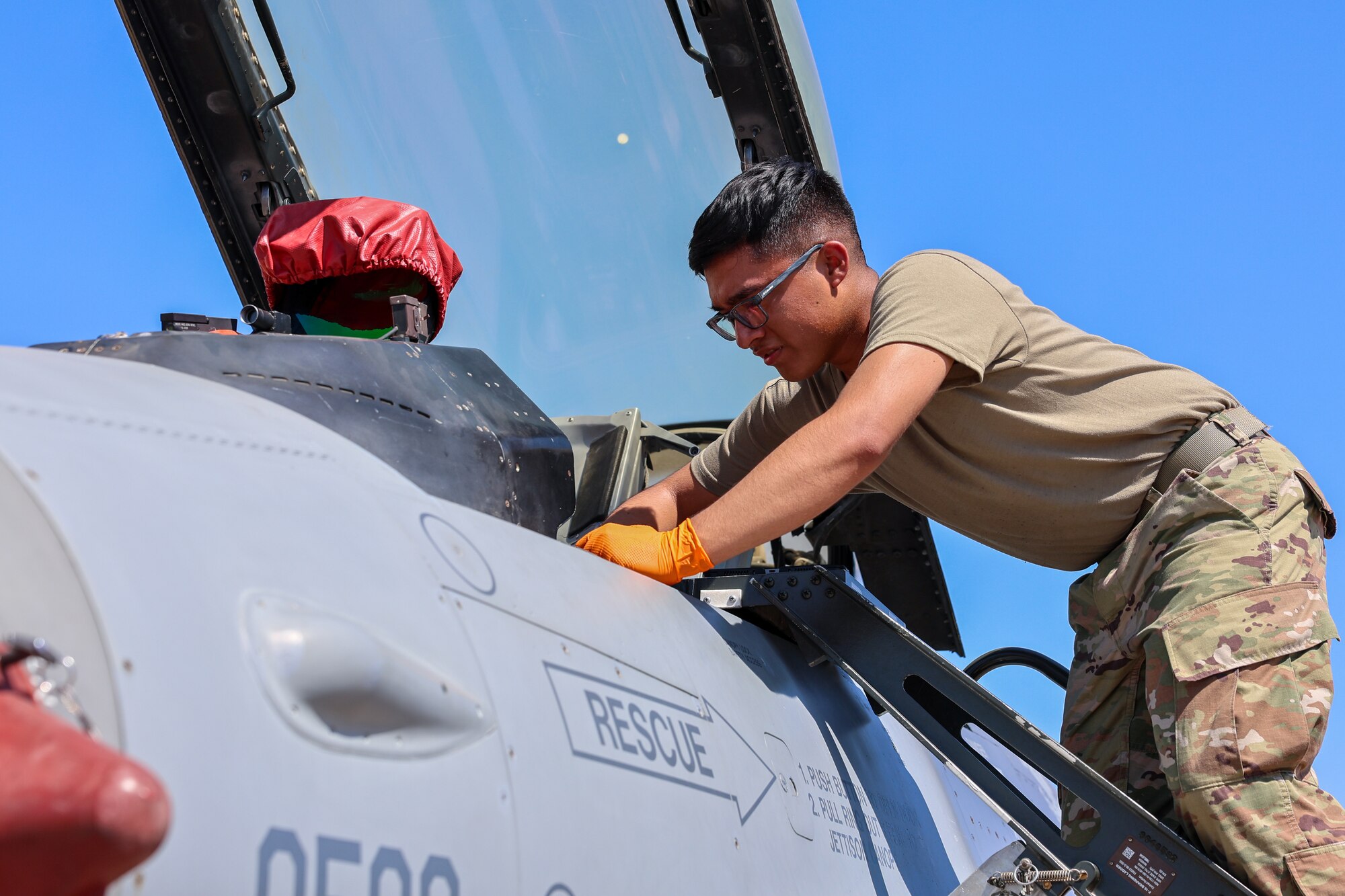 U.S. Air Force Airman in Training, assigned to the 82nd Training Wing, conducts an inspection of the cockpit of a F-16 Fighting Falcon during a Bracer Forge exercise at Sheppard Air Force Base, Texas, Sept. 11, 2025.