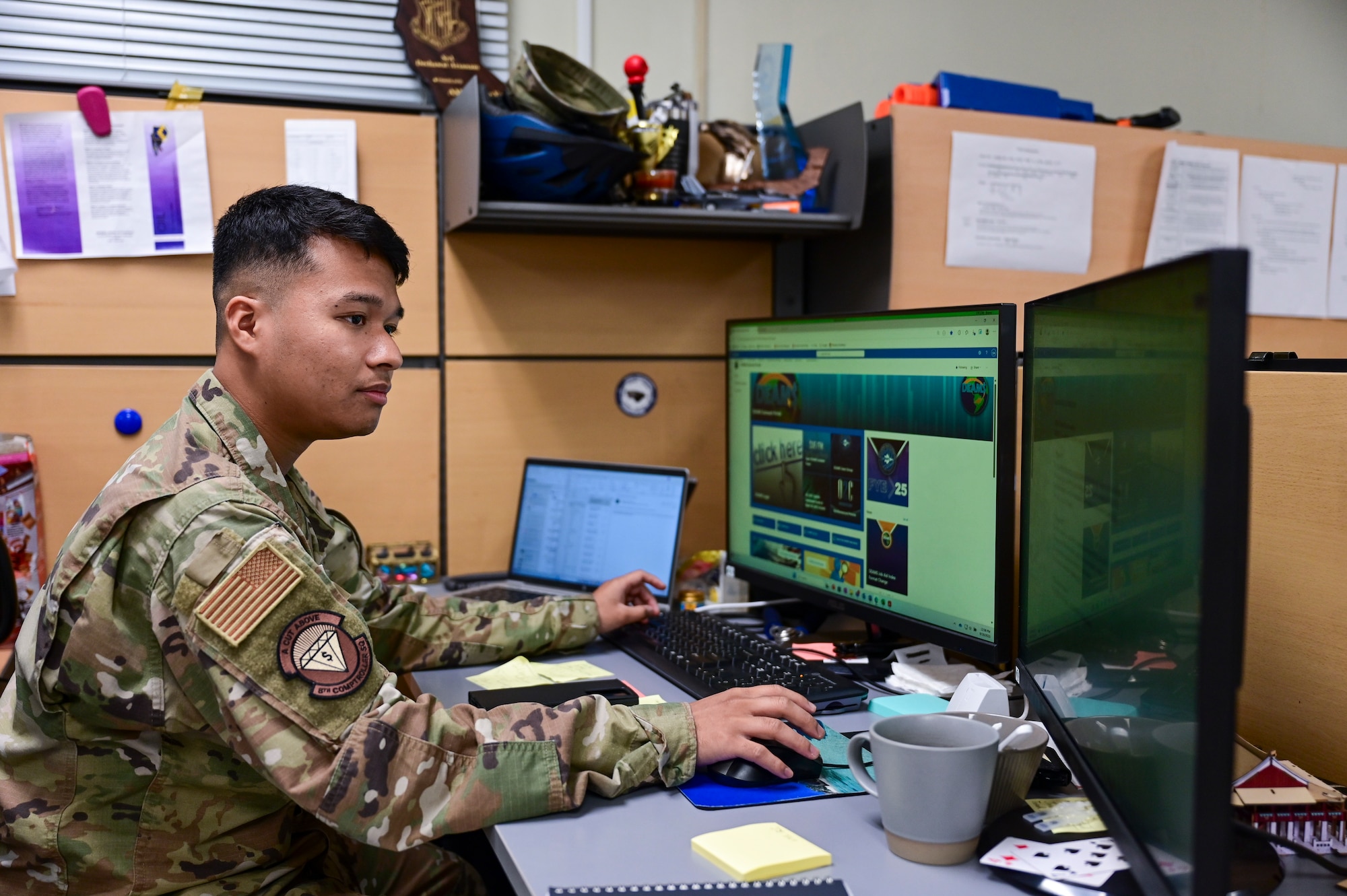 A man uses a computer.