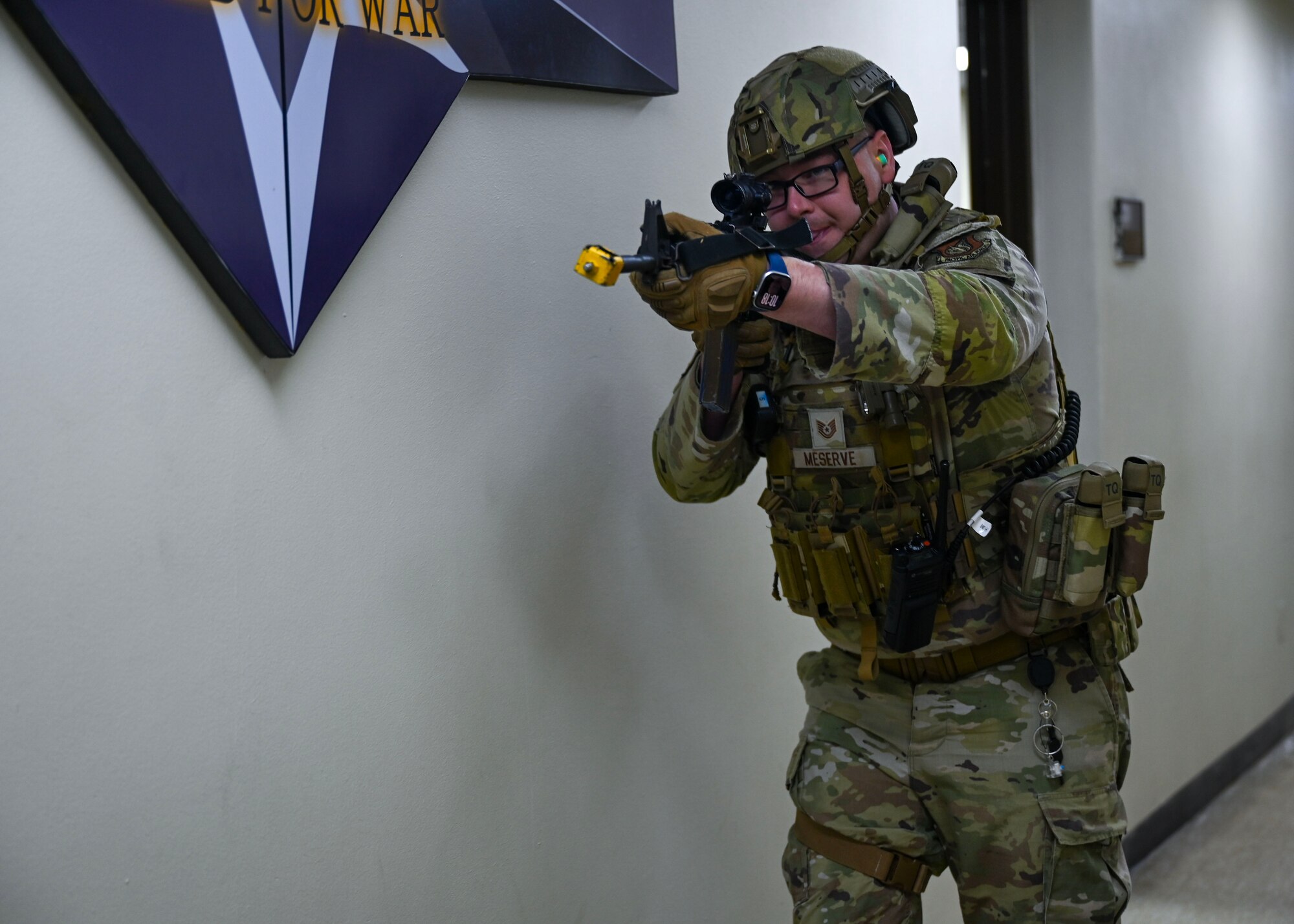 U.S. Air Force Tech. Sgt. Matthew Merserve, 51st Security Forces Squadron defender, stands guard during an active shooter exercise at Osan Air Base, Republic of Korea, Sept. 18, 2025. The exercise allowed Airmen to sharpen their ability to respond quickly under pressure. (U.S. Air Force photo by Staff Sgt. Sarah Williams)