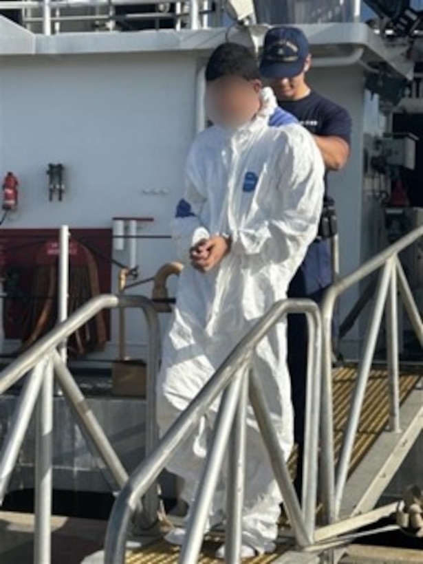 Coast Guard Heriberto Hernandez crewmembers transfer two suspected smugglers and 50 kilograms of cocaine to Coast Guard Investigative Service agents and Department of Homeland Security law enforcement partner agencies in San Juan, Puerto Rico, Sept. 12, 2025. Coast Guard Cutter Heriberto Hernandez interdicted a go-fast smuggling vessel off Dominican Republic, Aug. 31, 2025, which led to the seizure of the contraband and the apprehension of four smugglers.  Two other smugglers apprehended in this case were transferred to Dominican Republic Navy authorities. (U.S. Coast Guard photo)